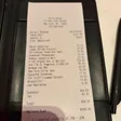 An itemized Strip House receipt showing a subtotal, tax, and printed total.
